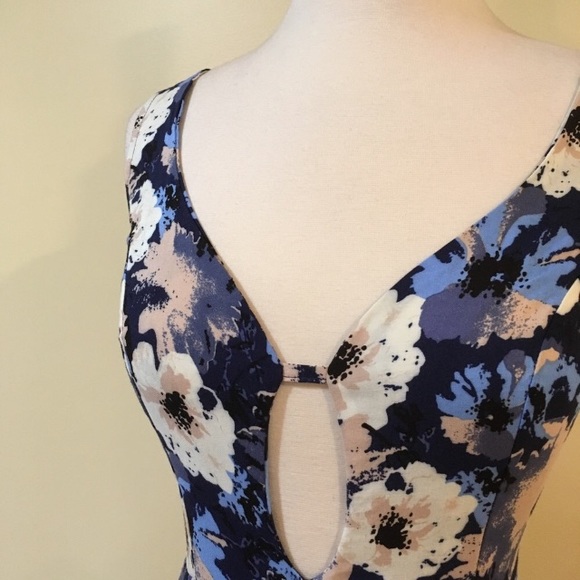 Flirty Cutout Front Deep V Back Floral Romper - Picture 5 of 6